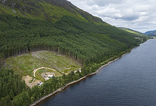 Aerial view of the Coire Glas site with the forest and the bank of the loch