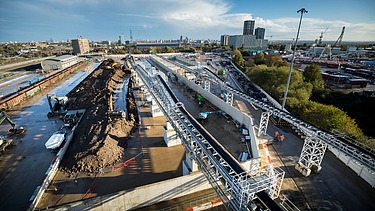2.7 kilometre above-ground conveyor belt system passing over railway bridges, roads, and canals.