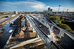 2.7 kilometre above-ground conveyor belt system passing over railway bridges, roads, and canals.