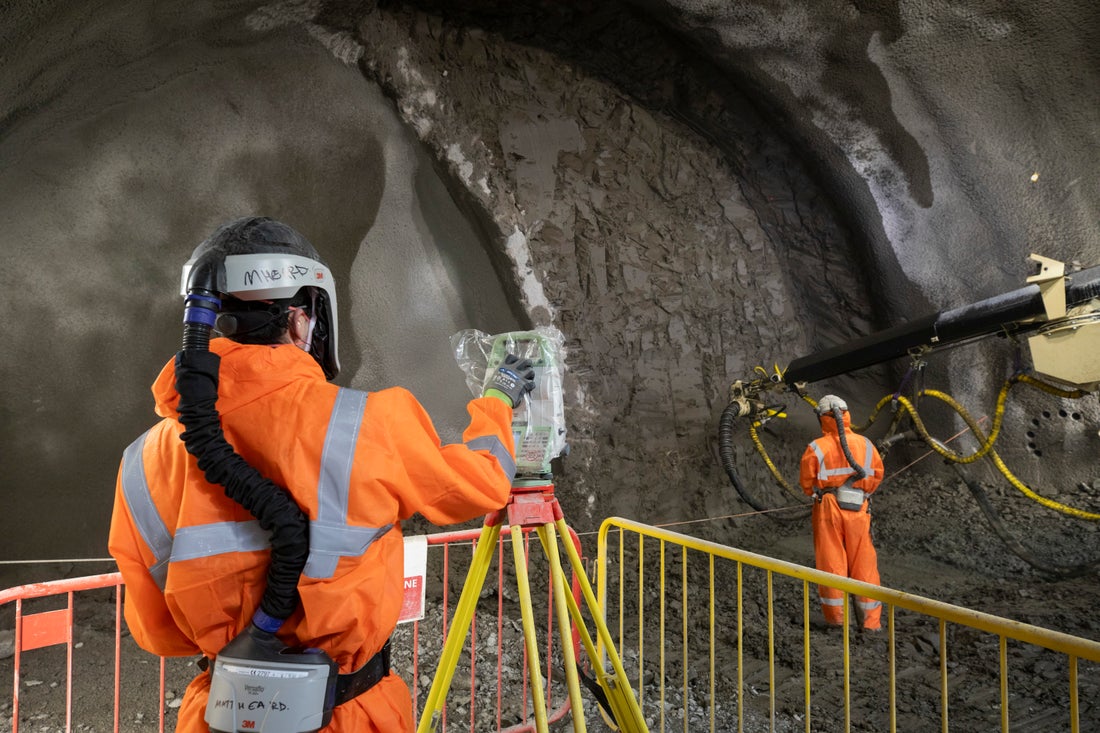 Spray concrete being applied in a tunnel