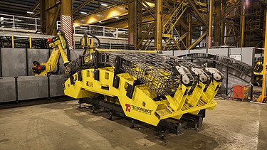 Robotics assembling a steel cage for the segments